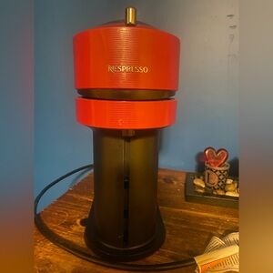 Nespresso Bold Red and Black Coffee Maker